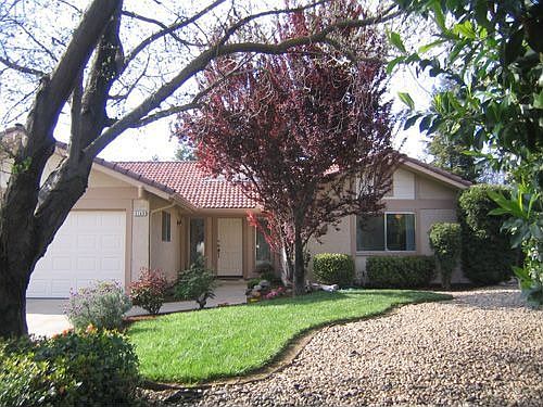 Front, with RV access on right (river rock)