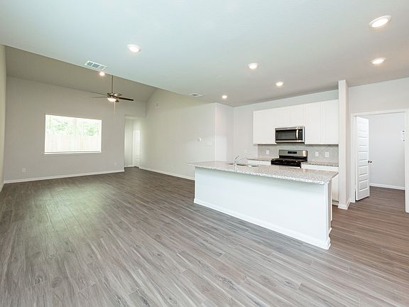 Dining Area to Kitchen and Family Room