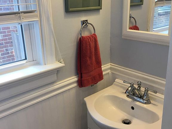 view of half bath near sliding glass door