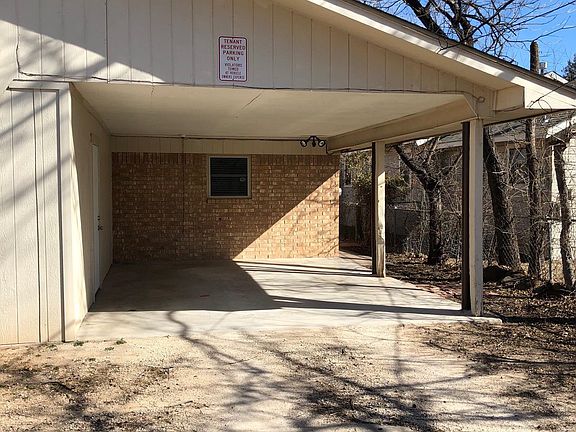 Carport w/full size laundry & storage