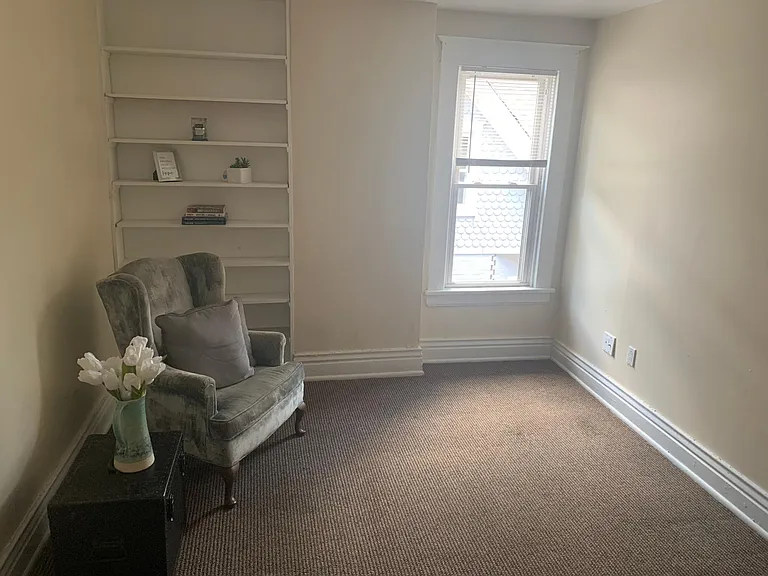Livingroom. Room is much larger than appears in this photo.