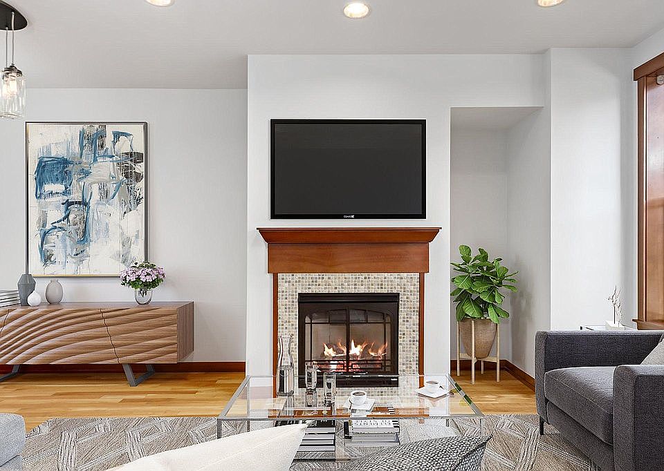 Living room with gas fireplace and media nook. (second floor)