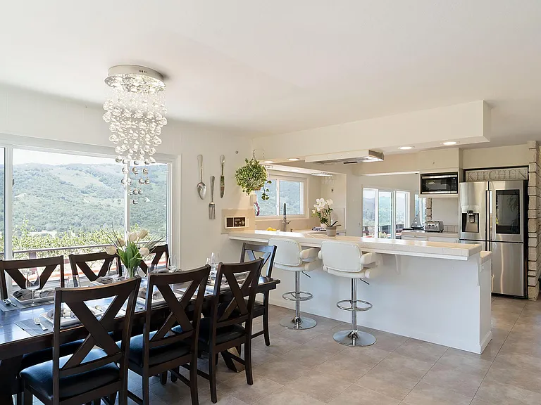 Breakfast bar and dining room. Great for entertaining.