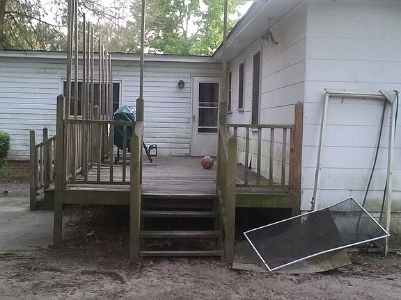 Large backyard with deck