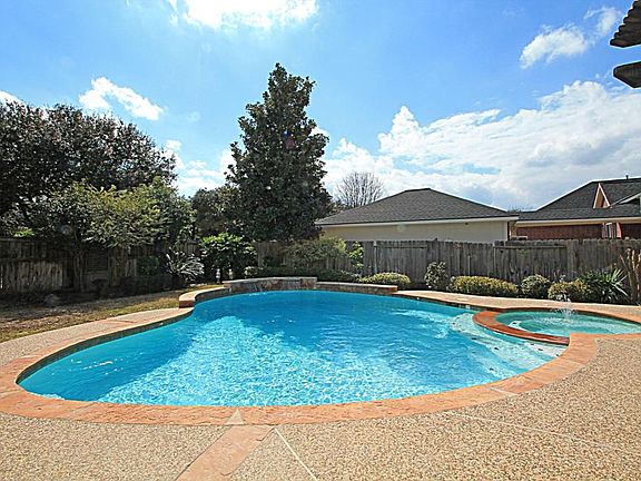 TAKE A DIP IN THIS POOL AND SPA ON THOSE HOT TEXAS DAYS