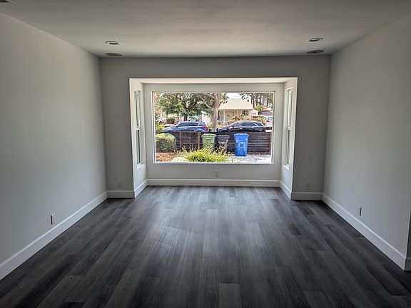 Living room looking at picture window.