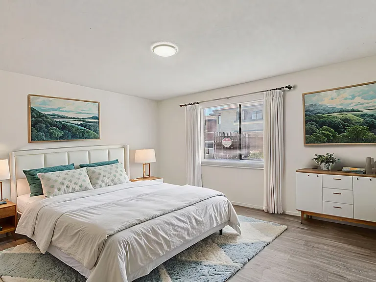 Beautiful bedroom with natural light pouring through