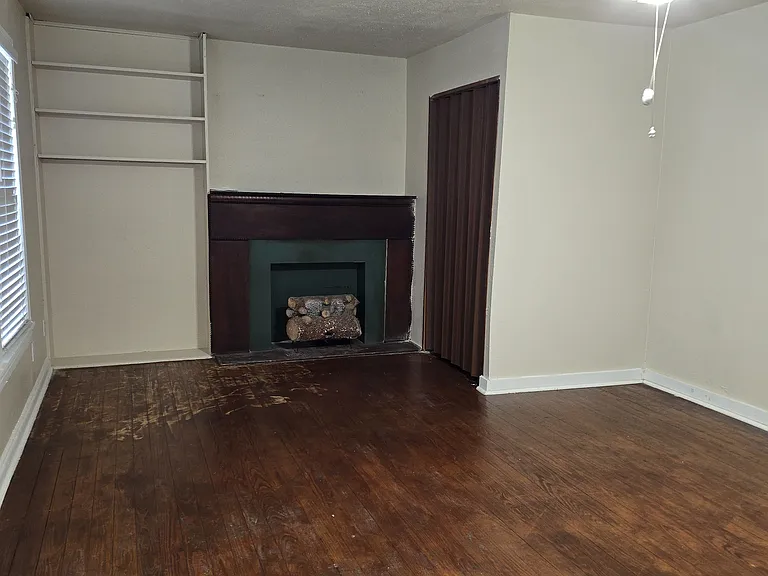 Large master bedroom with fireplace