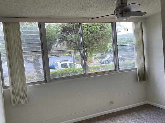 New carpet and ceiling fan in Bedroom