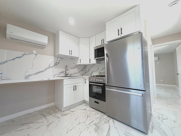 7443 Penfield Ave — Photo 3