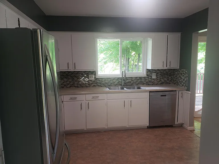 Kitchen facing backyard
