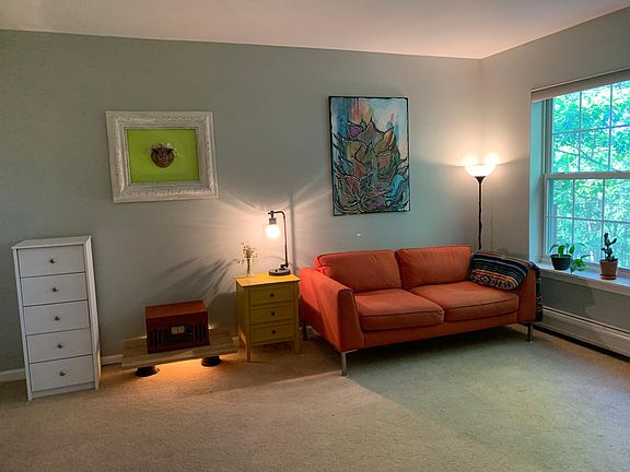 Large bedroom or multipurpose room with large windows