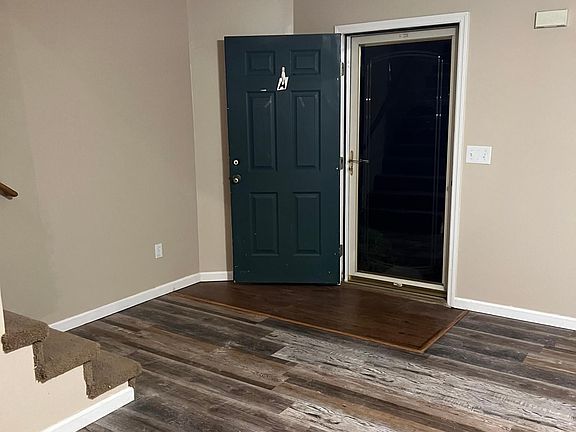 Large living room with new vinyl luxury flooring.