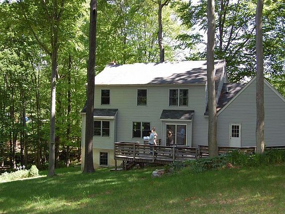 Back view of house 1.4 acre wooded lot
