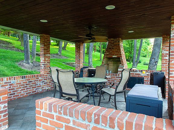 Pavilion by waterfall/pond