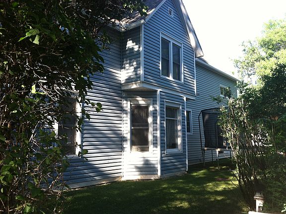 Other side of home, side yard.