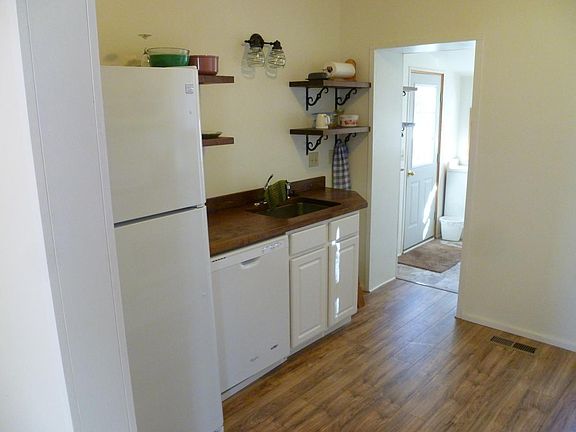 Kitchen with dishwasher, fridge...