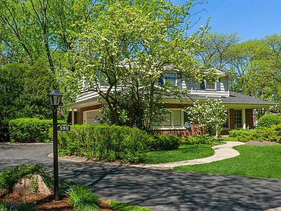 Many mature trees, flowering ornamentals and peren