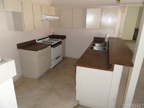 4th image of 7924 Woodman Ave Unit 56