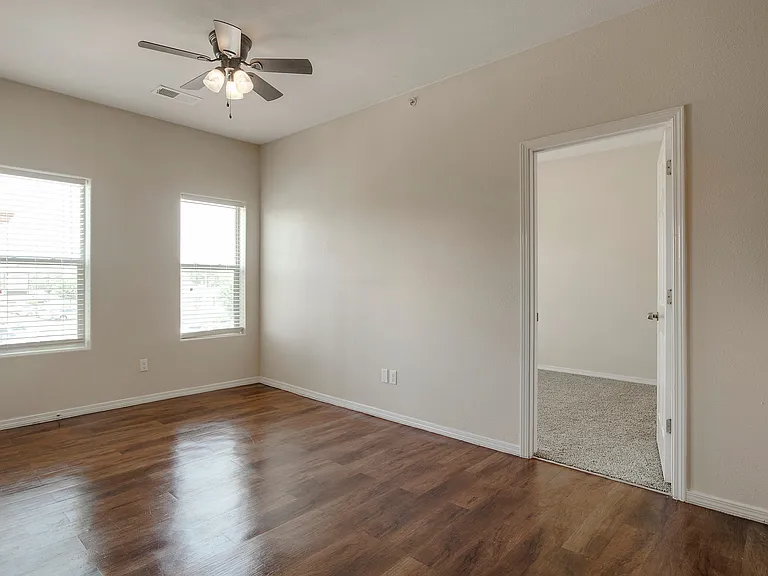 216 Dining/Living Room leading to East Bedroom