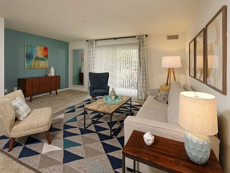 Classic Package I living room with carpeted flooring