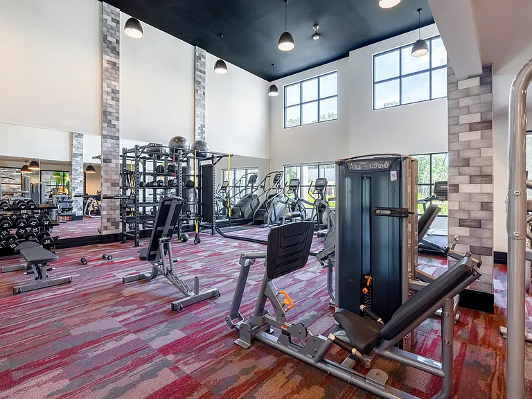 24-hour fitness center with cardio and weight-training