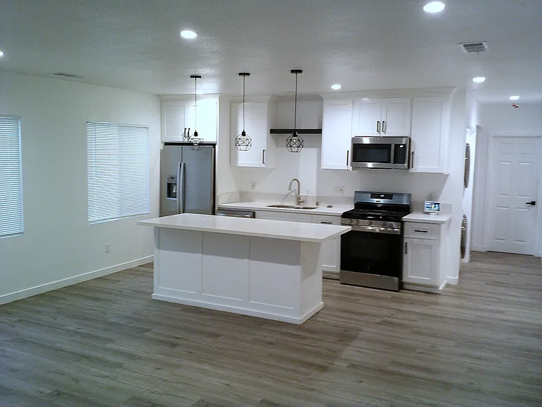 Kitchen View from Living Room space.