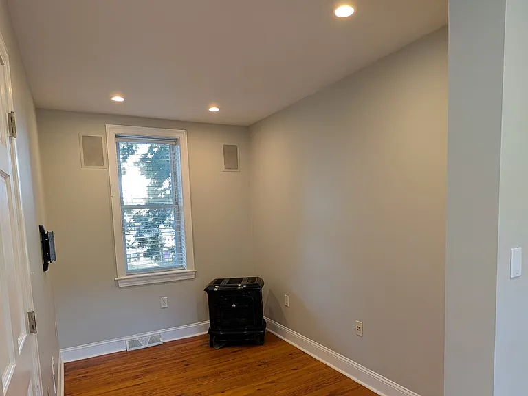 A room off the open space at the front of house has cast-iron gas fireplace that doesn't need electricity, keeping you warm doing severe winter weather.