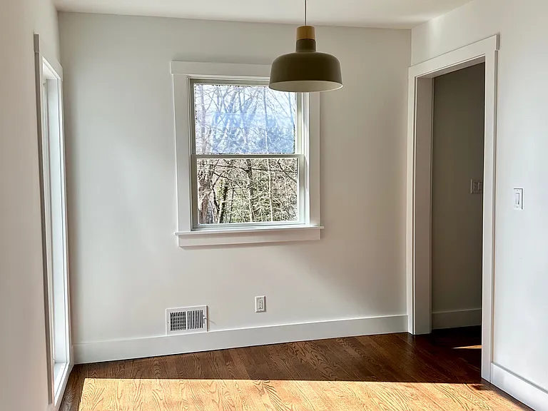 Eat in dining room, with access to screened in sun porch.