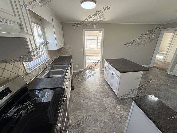 5th image of 210 Thrash St
