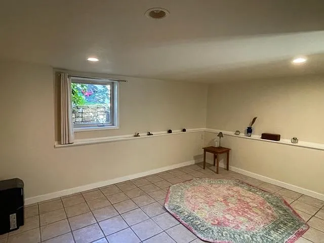 Bedroom has full closet, two windows and looks onto the back yard