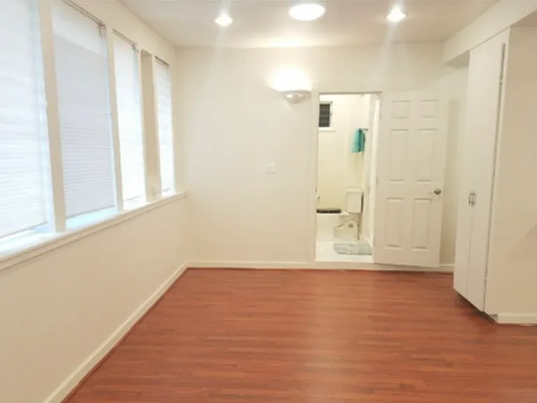 Space for a dining room table. Pantry for food and linens on the right side.
