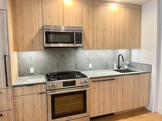 Rented by E Realty International Corp | media 13