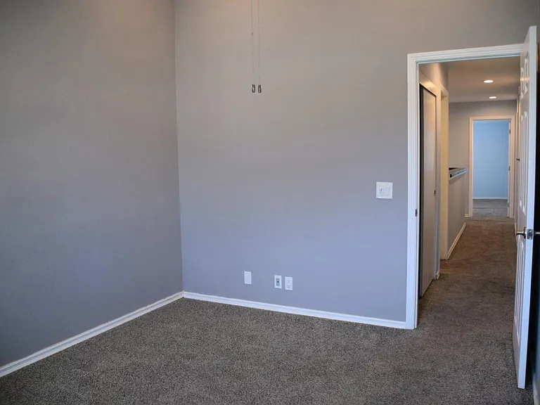 Bedroom 3 has high ceiling
11x10
the storage closet can be seen in hallway on left. The bathroom is just past it on the left.