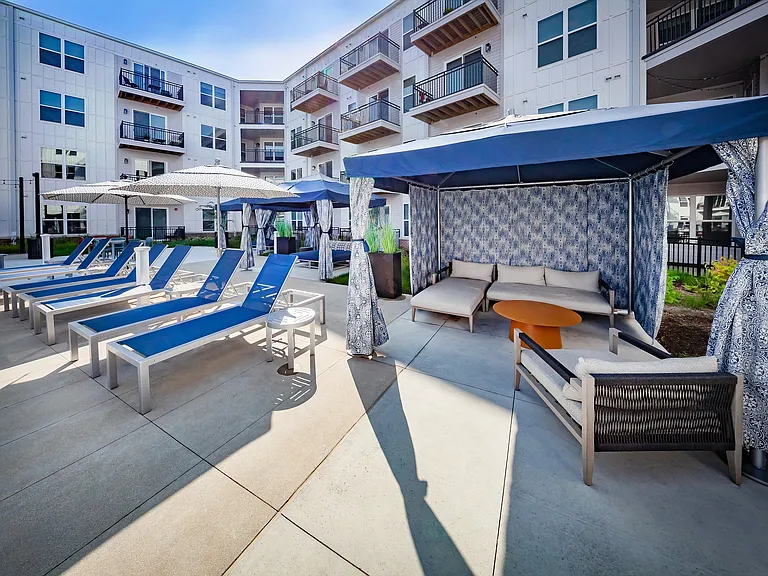 Escape the sun under a cabana or one of the many umbrellas surrounding the pool.