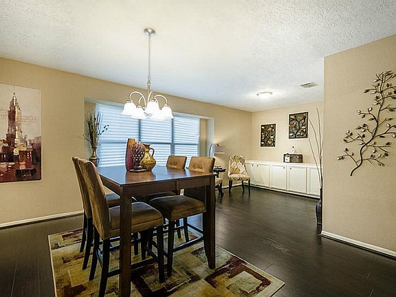 Huge formal dinning room space with buffet table!