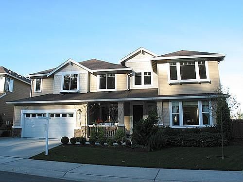 Elegant exterior, with gorgeous landscaping!
