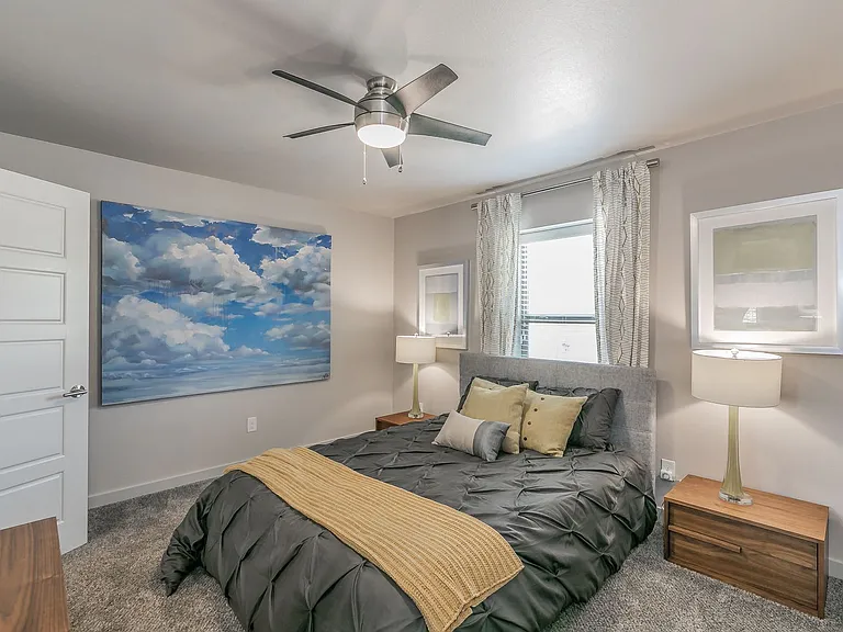 Cozy bedroom with soft lighting and plenty of space to unwind.