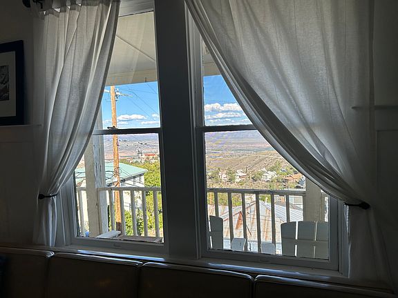Gorgeous Views of Jerome from this Top Floor Apartment, featuring private access to your own wrap-around porch.