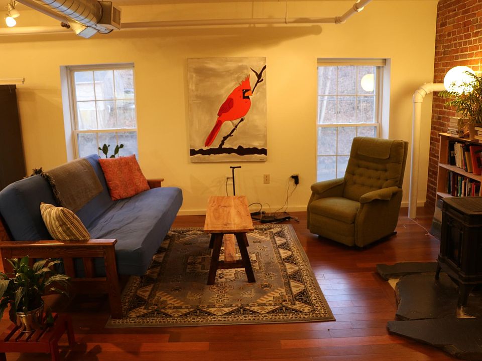 Living room with gas stove.