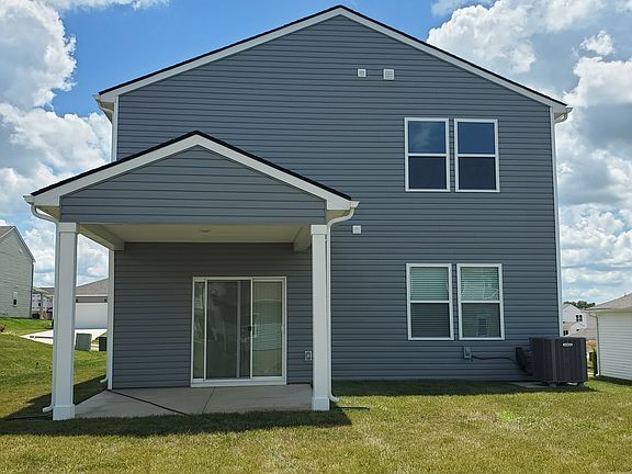 Back view with covered patio
