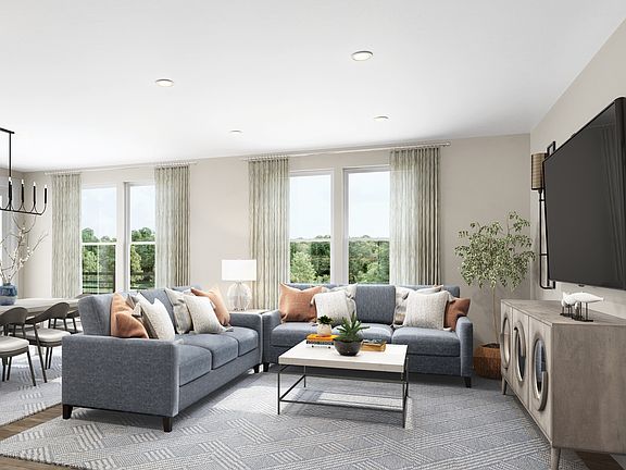 An open-concept main living area features ample natural light.