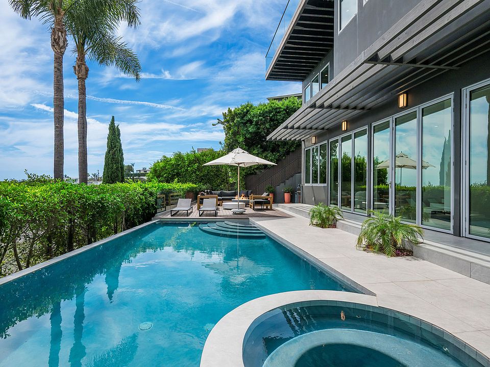Outdoor hot tub with unmatched skyline views.