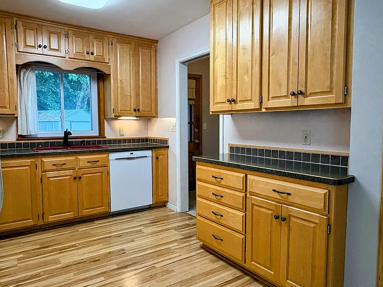 Beautifully updated kitchen, Custom Maple Cabinetry.