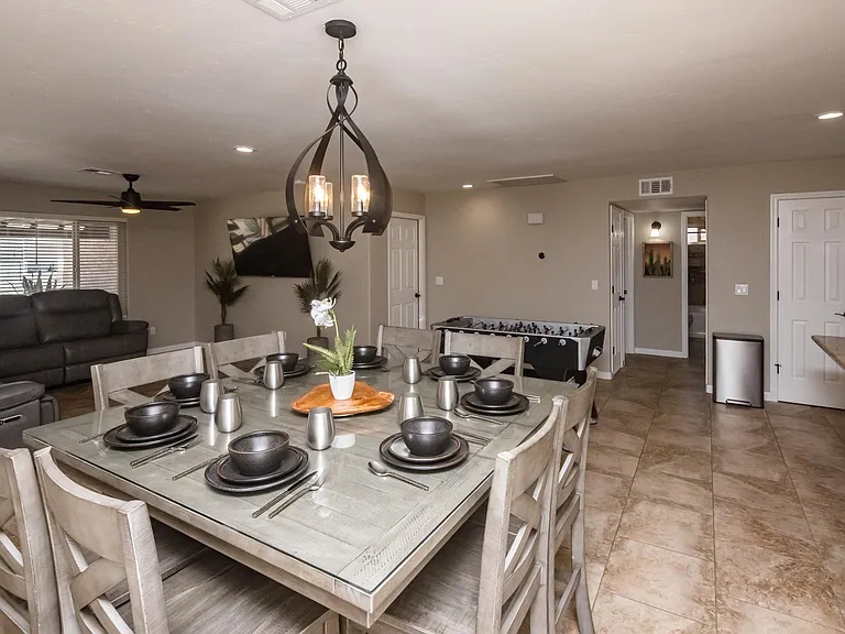 Open-concept design connecting dining, living, and kitchen areas _ ideal for comfortable everyday living and entertaining.