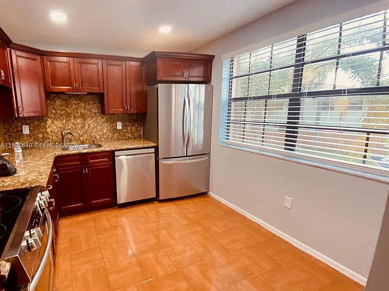 9890 Hammocks Blvd #107-56 — Photo 12