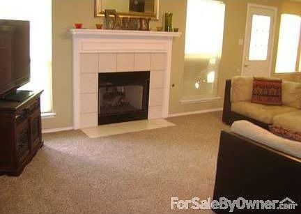 Living room : Fire place, very spacious living room, this is shown with a 10X10 couch!