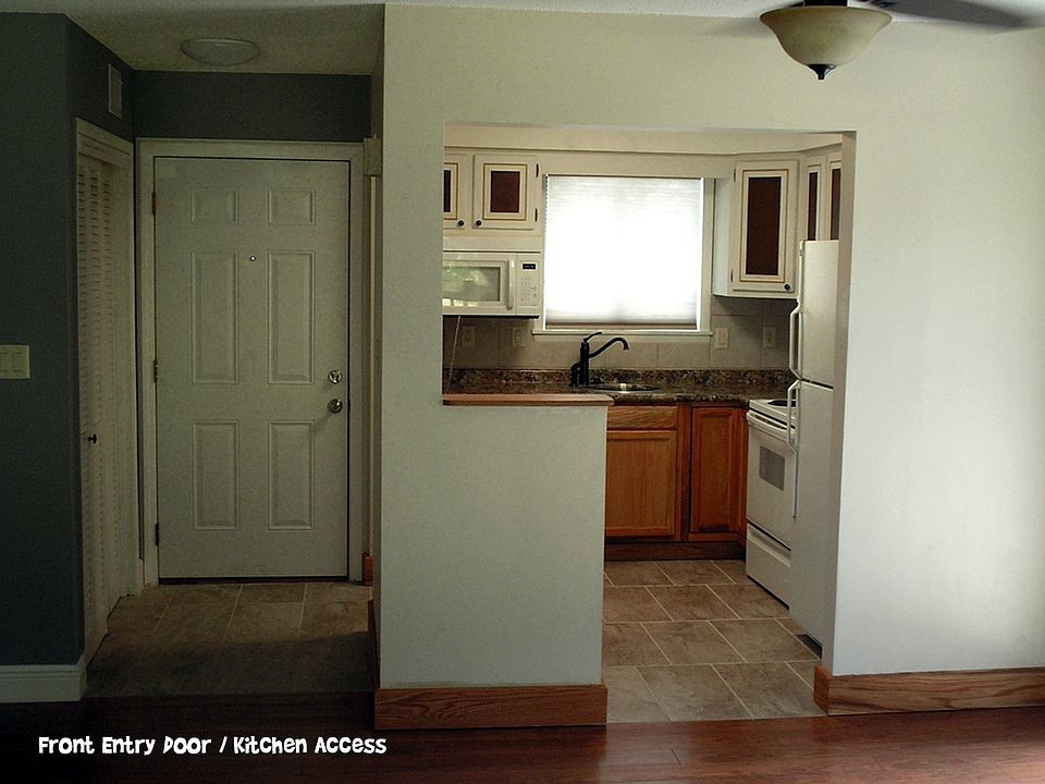 Metal Door Front Entry to Kitchen