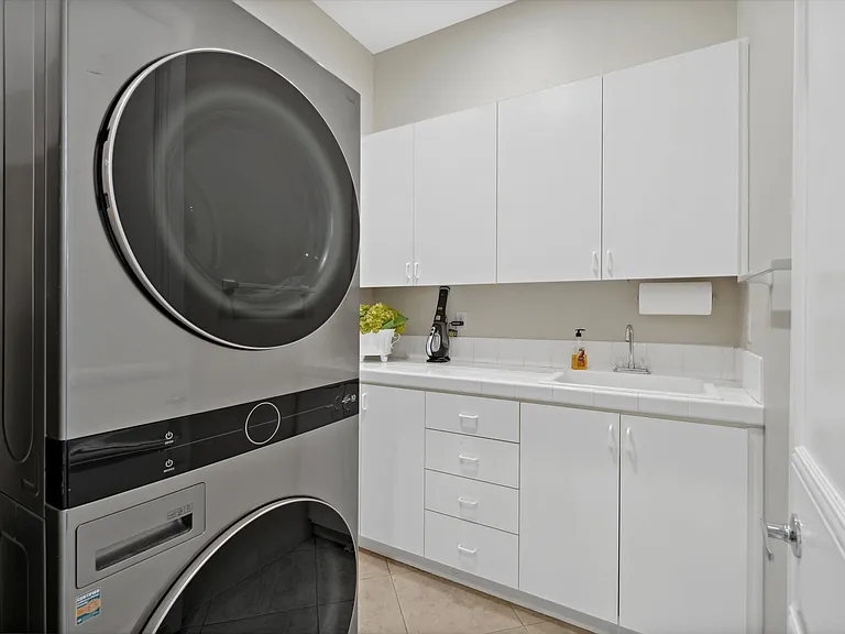 Laundry room with full sized washer & dryer