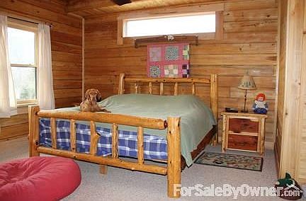 Master Bedroom
						:
						Master Bed and master bath with tile floors and pebble tile shower